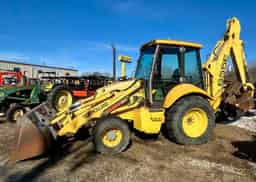 **SALE PENDING** TRACTOR, LOADER, BACKHOE – NEW HOLLAND 655E