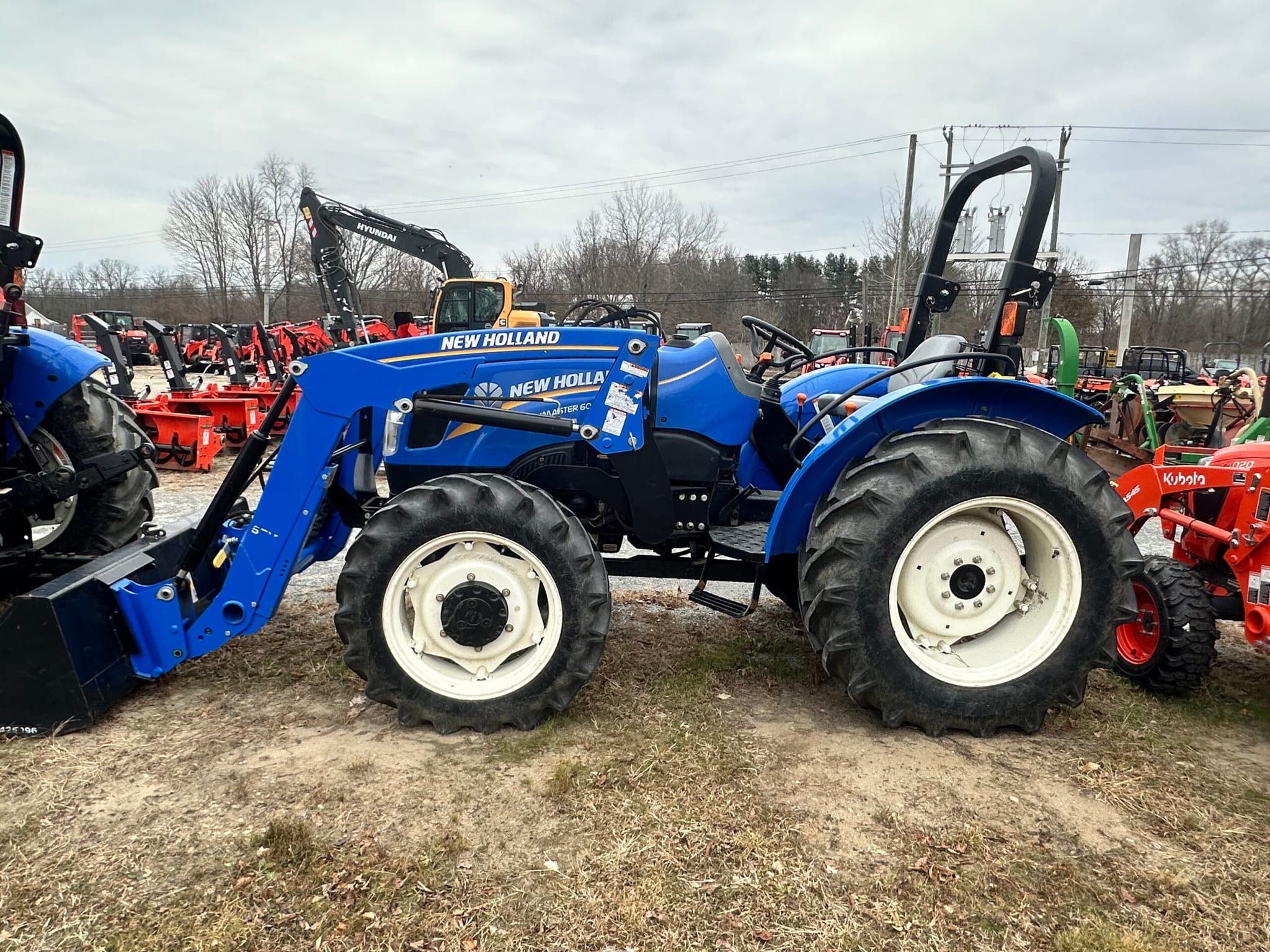 **UNDER DEPOSIT** TRACTOR-LOADER, NEW HOLLAND WORKMASTER 60